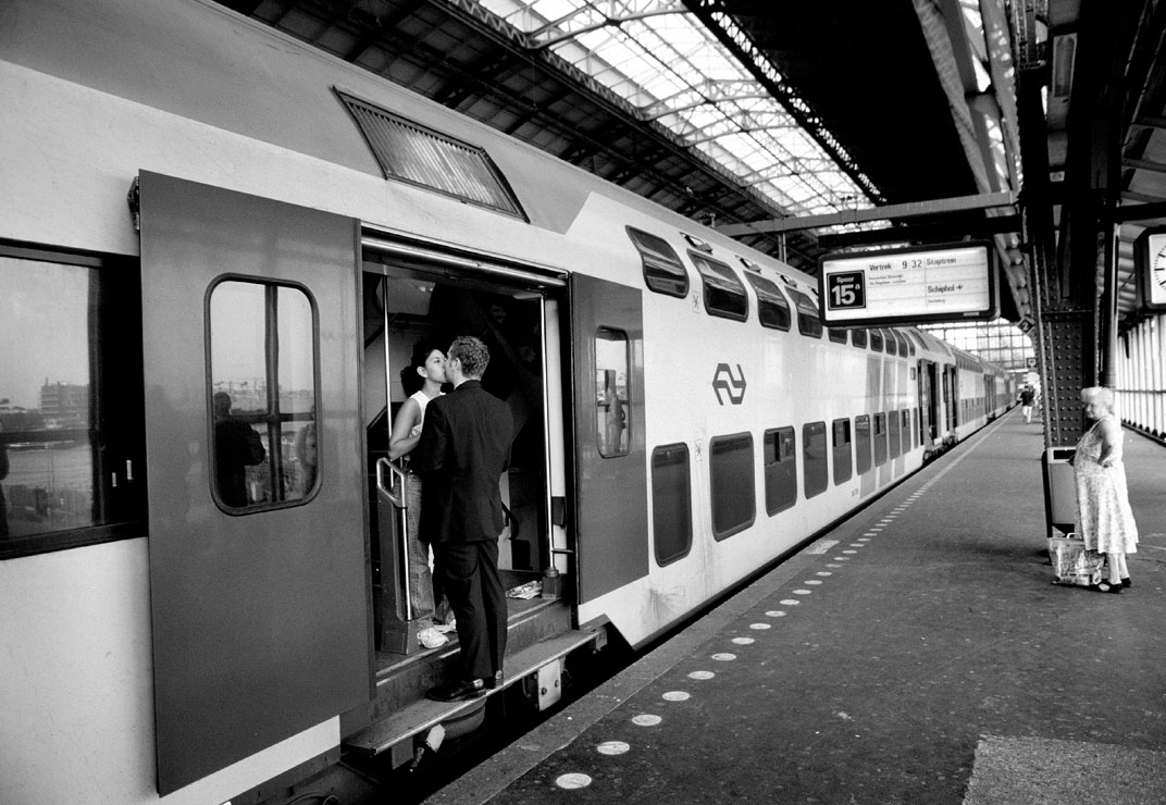 Couple kissing on Amsterdam Train